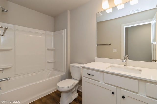 136 Creekside Dr, Bondurant, IA 50035 - bathroom with wood finished floors, vanity, and washtub / shower combination