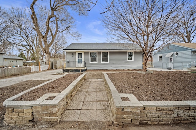 view of front of home with fence