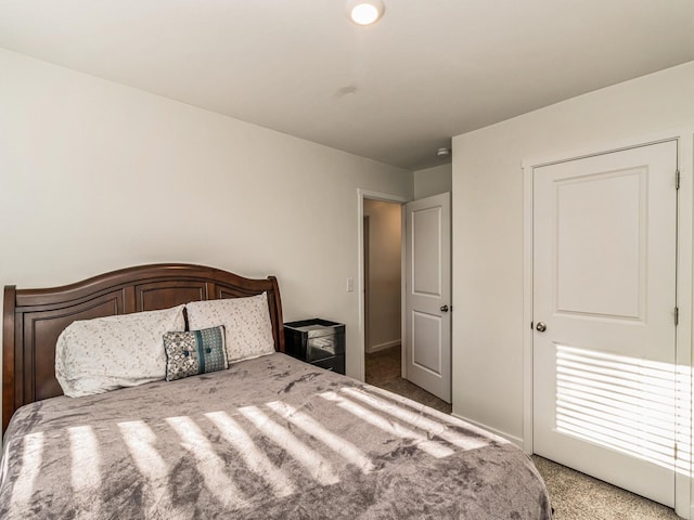 bedroom with light carpet