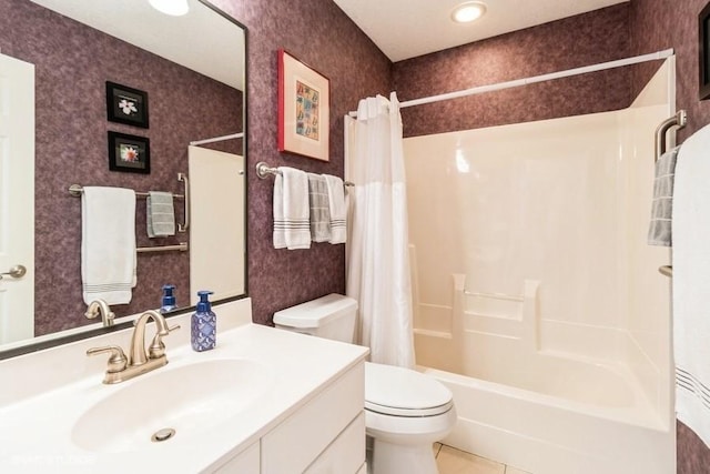 bathroom featuring tile patterned flooring, wallpapered walls, toilet, and shower / tub combo with curtain