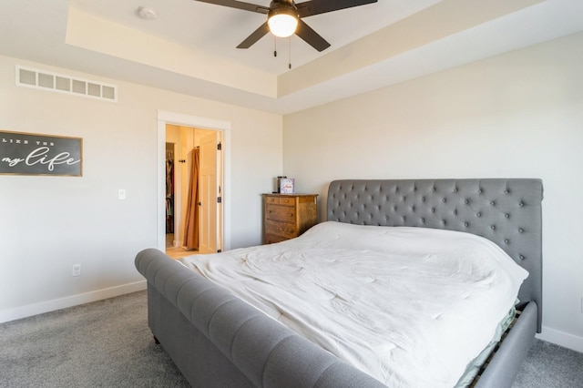 1602 Mulberry St, Granger, IA 50109 - bedroom featuring carpet flooring, baseboards, a raised ceiling, and a ceiling fan