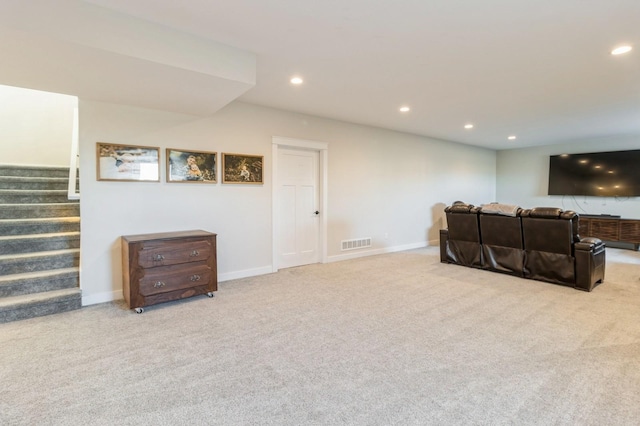 living room featuring carpet flooring, recessed lighting, stairs, and baseboards