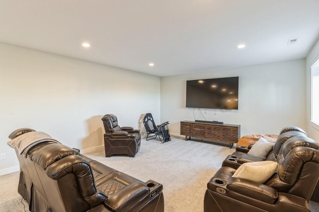 living area featuring carpet flooring, recessed lighting, and baseboards