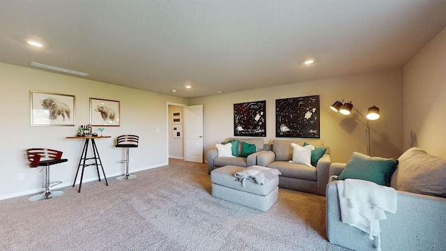 1007 33rd St SE, Altoona, IA 50009 - living room with carpet floors, recessed lighting, and baseboards