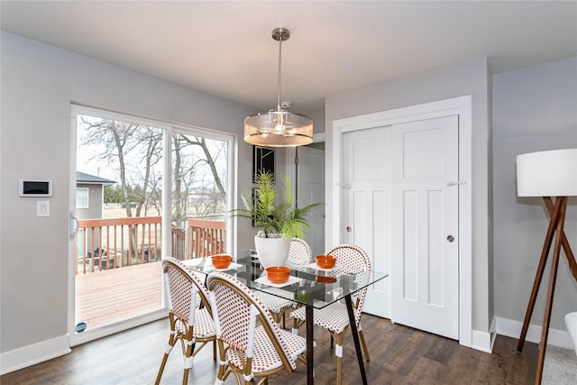 104 Mcpherson St, Boone, IA 50036 - dining area with dark wood-style flooring