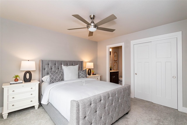 104 Mcpherson St, Boone, IA 50036 - bedroom featuring light carpet, a closet, ensuite bathroom, and ceiling fan
