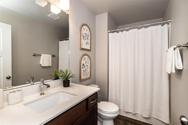 104 Mcpherson St, Boone, IA 50036 - bathroom with vanity and wood finished floors