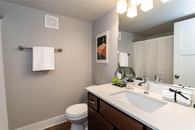 104 Mcpherson St, Boone, IA 50036 - full bathroom with vanity, a shower with curtain, and wood finished floors
