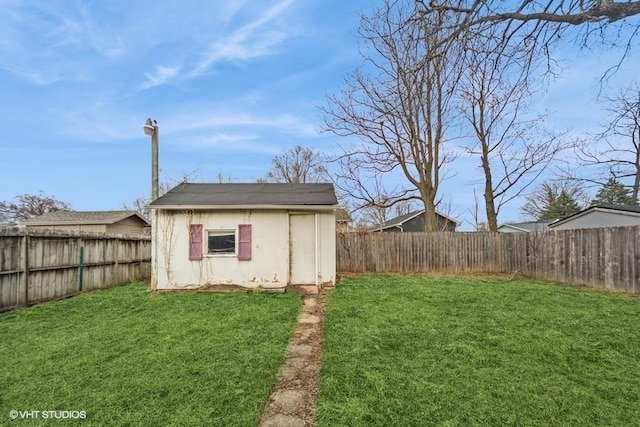 view of shed featuring a fenced backyard
