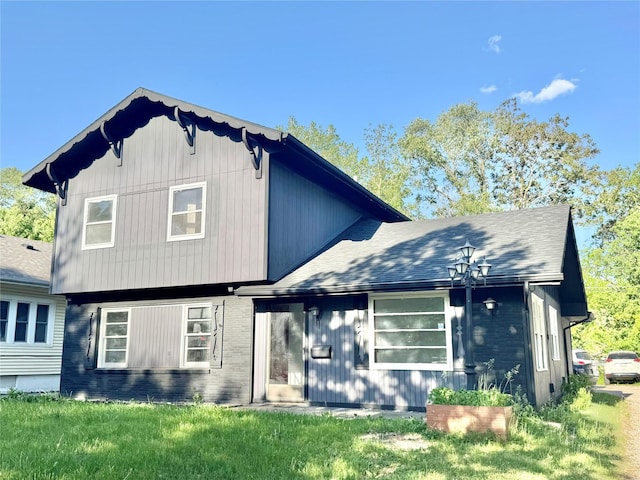 3841 Columbia St, Des Moines, IA 50313 - view of front of house with brick siding and a shingled roof