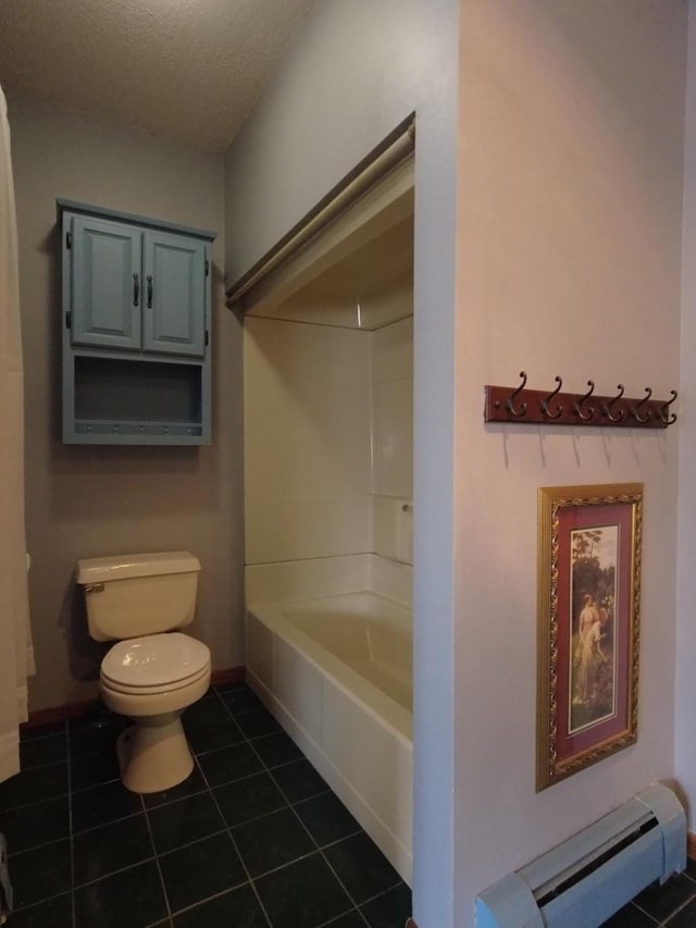 1408 Lincoln St, Gowrie, IA 50543 - full bathroom with a baseboard radiator, a textured ceiling, baseboards, toilet, and tile patterned flooring