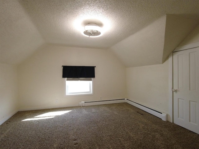1408 Lincoln St, Gowrie, IA 50543 - additional living space with vaulted ceiling and carpet floors
