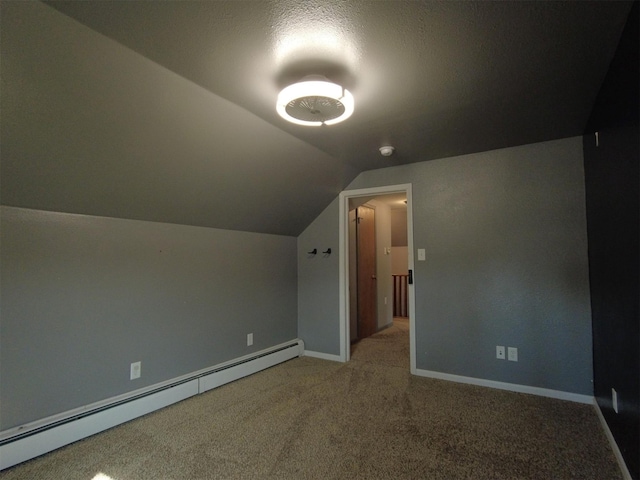 1408 Lincoln St, Gowrie, IA 50543 - additional living space featuring lofted ceiling, baseboard heating, baseboards, and carpet