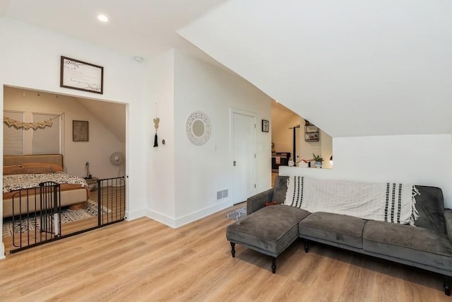 222 W State St, Colfax, IA 50054 - living area with wood finished floors and recessed lighting