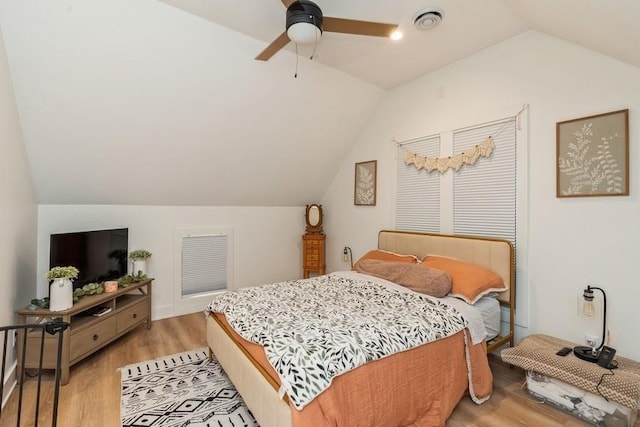 222 W State St, Colfax, IA 50054 - bedroom featuring vaulted ceiling, light wood-style flooring, and ceiling fan