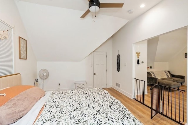 222 W State St, Colfax, IA 50054 - bedroom featuring light wood finished floors, lofted ceiling, ceiling fan, and recessed lighting