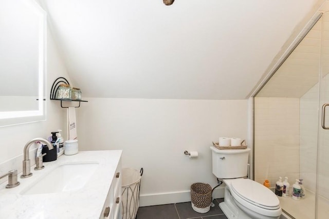 222 W State St, Colfax, IA 50054 - bathroom featuring vaulted ceiling, tile patterned flooring, a shower stall, and vanity