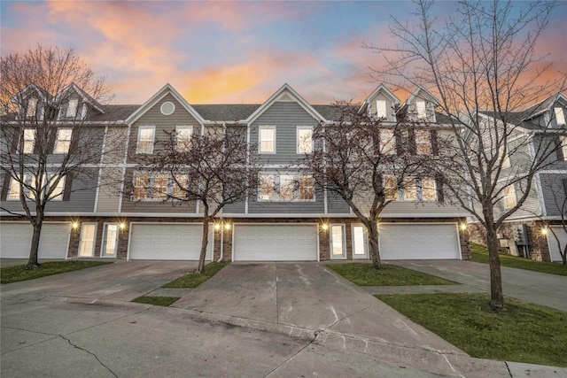 5558 Boston Ct, Johnston, IA 50131 - multi unit property featuring a garage and driveway