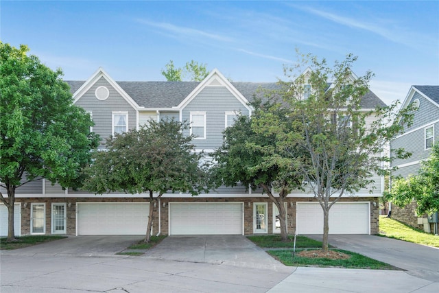 5558 Boston Ct, Johnston, IA 50131 - view of front of home featuring driveway and an attached garage