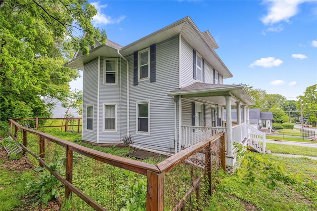 951 24th St, Des Moines, IA 50312 - view of home's exterior featuring a porch