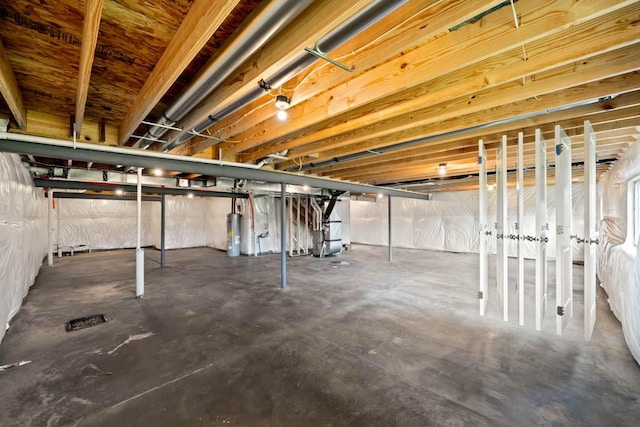 125 NW Rolling Cir, Waukee, IA 50263 - unfinished basement featuring water heater and heating unit