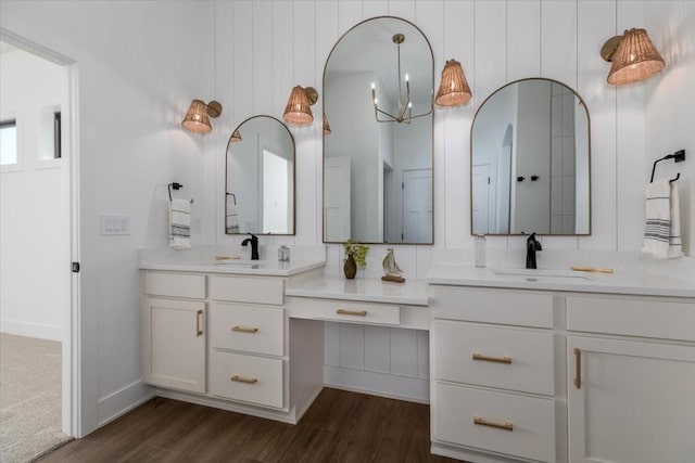 1296 Bee Tree Ln, Ellston, IA 50074 - full bathroom featuring vanity, wood finished floors, and baseboards