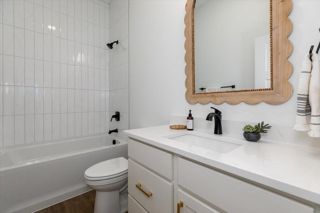 1296 Bee Tree Ln, Ellston, IA 50074 - full bath with vanity, toilet, shower / bathtub combination, and wood finished floors