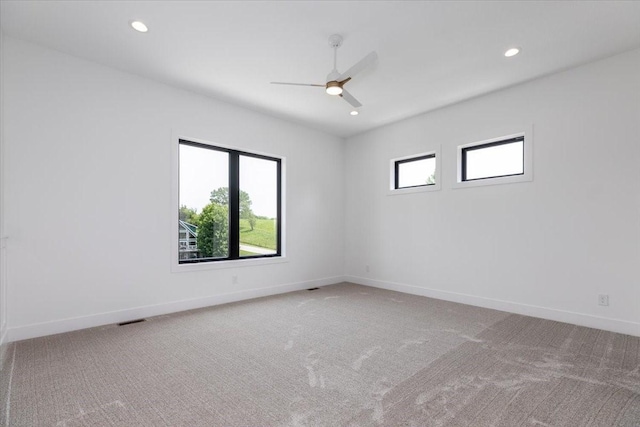 1296 Bee Tree Ln, Ellston, IA 50074 - empty room featuring ceiling fan, baseboards, recessed lighting, and carpet floors