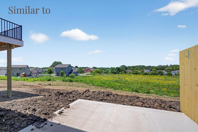 2926 Lake Hill Dr, Des Moines, IA 50320 - view of yard with a patio, a residential view, and a balcony