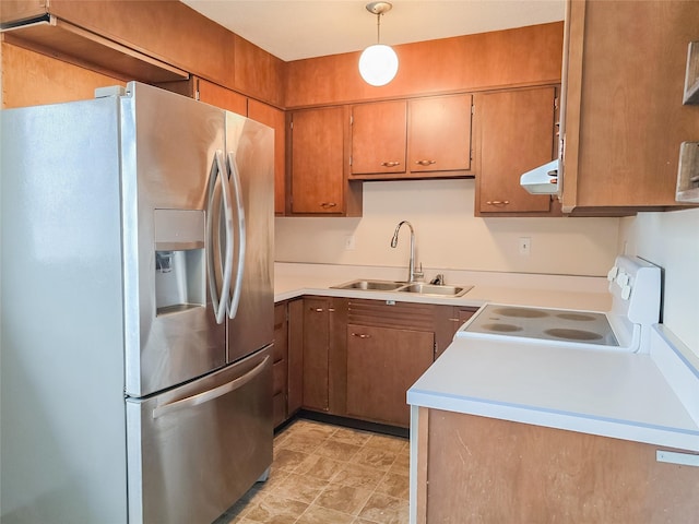 kitchen with white electric range oven, a sink, light countertops, under cabinet range hood, and stainless steel fridge with ice dispenser