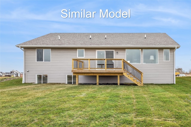 rear view of house featuring a deck, a lawn, roof with shingles, and stairs