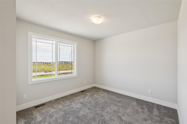 1430 Werthman Dr, Waukee, IA 50263 - carpeted spare room featuring baseboards