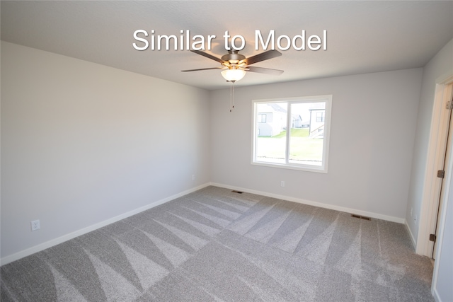 empty room featuring ceiling fan, carpet, and baseboards
