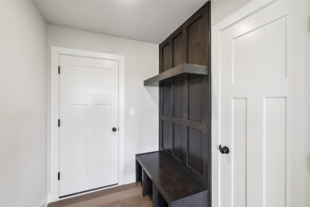 1440 Werthman Dr, Waukee, IA 50263 - mudroom with wood finished floors and baseboards