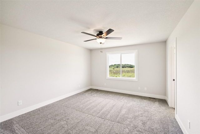 1440 Werthman Dr, Waukee, IA 50263 - carpeted spare room featuring ceiling fan and baseboards
