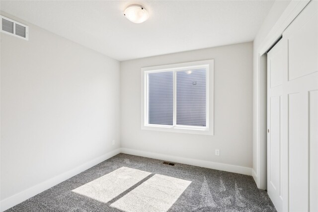 1440 Werthman Dr, Waukee, IA 50263 - unfurnished bedroom with carpet flooring and baseboards