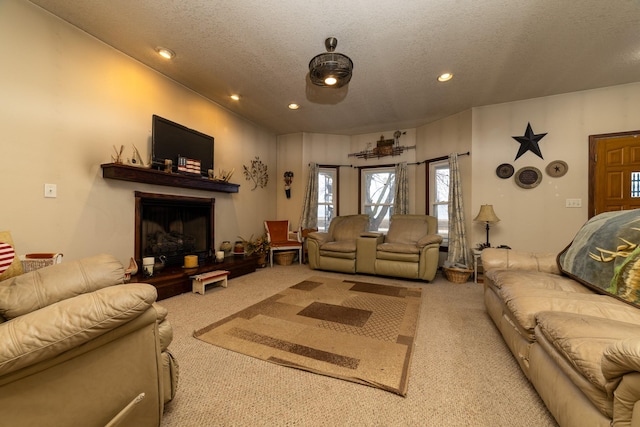 2141 320th St, Fort Dodge, IA 50501 - carpeted living area with recessed lighting and a textured ceiling