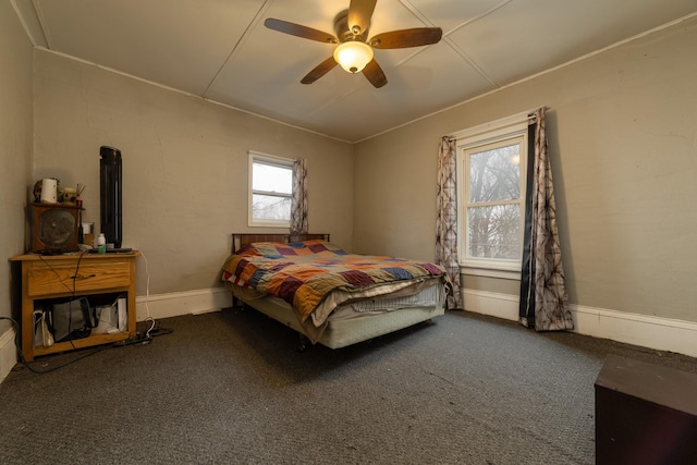 2141 320th St, Fort Dodge, IA 50501 - carpeted bedroom featuring ceiling fan