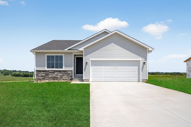 1911 20th Ave SE, Altoona, IA 50009 - view of front facade featuring a front lawn, an attached garage, concrete driveway, stone siding, and roof with shingles