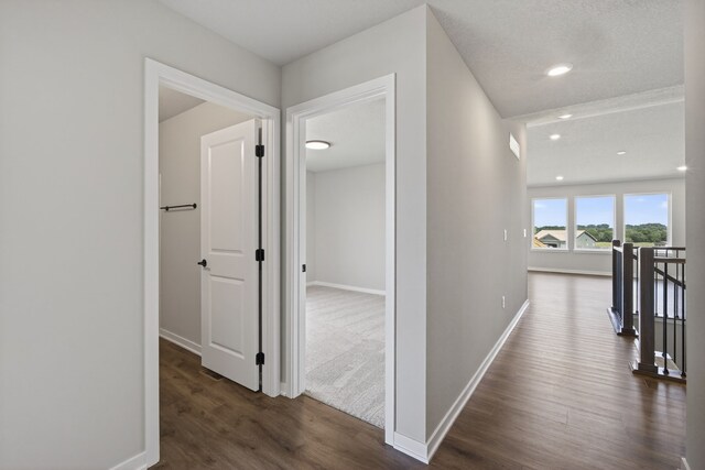 1911 20th Ave SE, Altoona, IA 50009 - corridor with dark wood-type flooring, an upstairs landing, and recessed lighting
