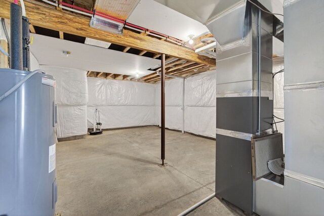 1911 20th Ave SE, Altoona, IA 50009 - unfinished below grade area featuring electric water heater and heating unit