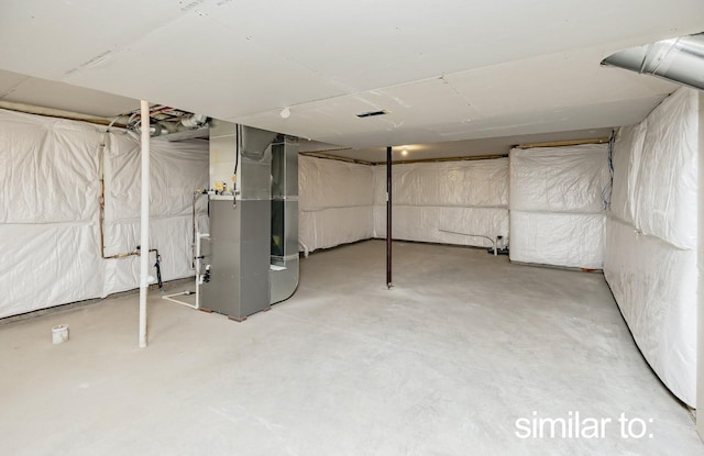 16614 Walnut Meadows Dr, Urbandale, IA 50323 - unfinished basement with heating unit