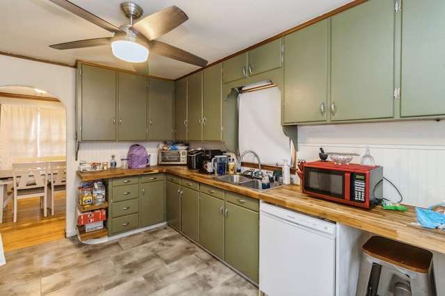 807 Virginia Ave, Des Moines, IA 50315 - kitchen featuring a sink, green cabinets, ceiling fan, butcher block countertops, and white dishwasher