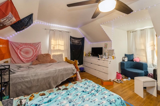 807 Virginia Ave, Des Moines, IA 50315 - bedroom with a ceiling fan, wood finished floors, and lofted ceiling