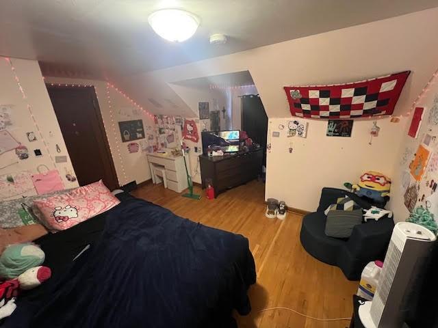 807 Virginia Ave, Des Moines, IA 50315 - bedroom with vaulted ceiling and wood finished floors