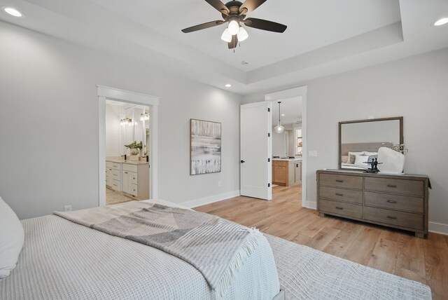 18167 Alderleaf Dr, Clive, IA 50325 - bedroom featuring recessed lighting, light wood-style flooring, baseboards, and ensuite bath