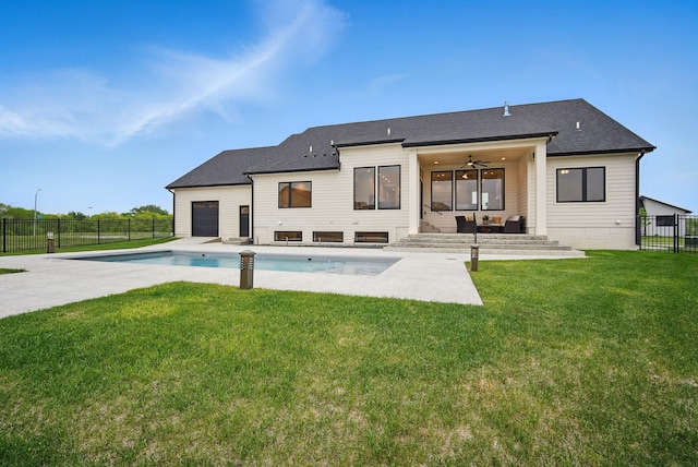 18167 Alderleaf Dr, Clive, IA 50325 - back of property featuring an outdoor hangout area, ceiling fan, a garage, a patio, and a shingled roof