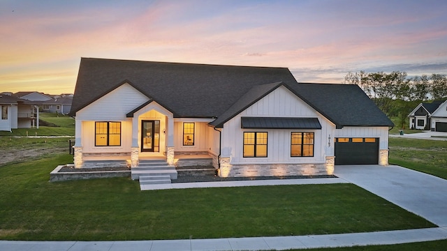18167 Alderleaf Dr, Clive, IA 50325 - modern farmhouse style home with an attached garage, board and batten siding, concrete driveway, a yard, and roof with shingles