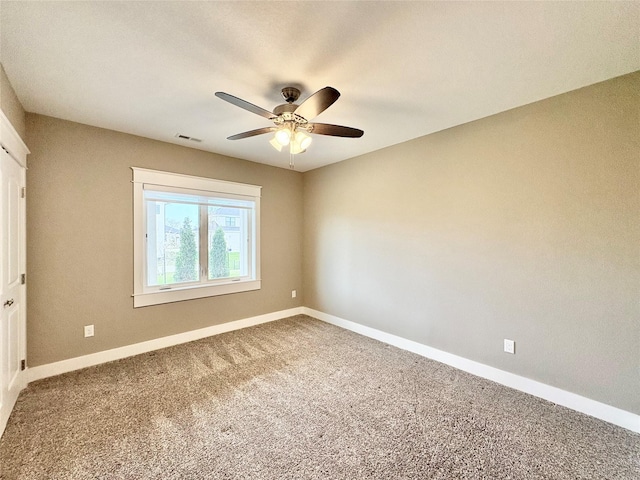 17595 Aurora Dr, Clive, IA 50325 - unfurnished bedroom with carpet flooring, baseboards, and a ceiling fan