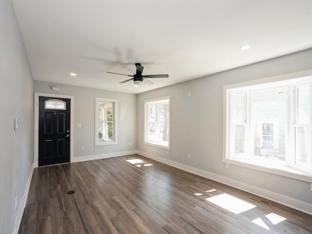 613 E 8th St N, Newton, IA 50208 - entryway with baseboards, dark wood-style flooring, ceiling fan, and recessed lighting